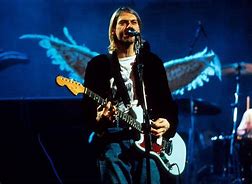 Kurt Cobain performing.